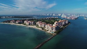 Welcome to Paradise Found on Fisher Island! ✨ Experience the epitome...
