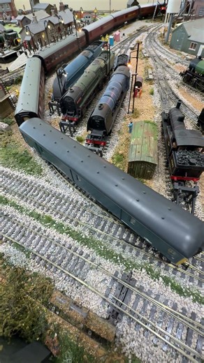 Class 128 passes the steam engine sidings.