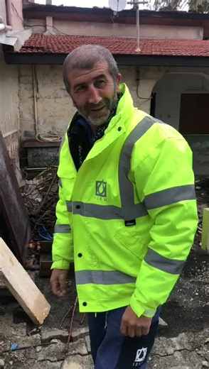 Professional Worker Fixing Pipe in Safety Gear