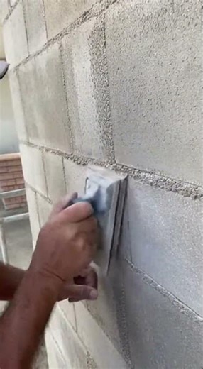 Smoothing Cement Walls: The Circular Sanding Technique #DIY #HomeImprovement #ConstructionSkills