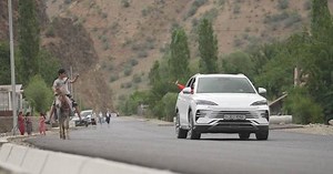 China-Tajikistan Highway under renovation transforms travel, trade in remote mountains