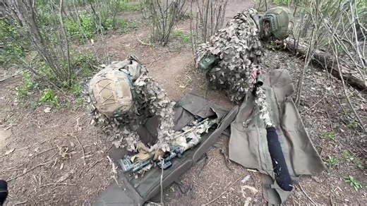 Russian snipers 'hit Ukrainian soldiers while providing cover fire'