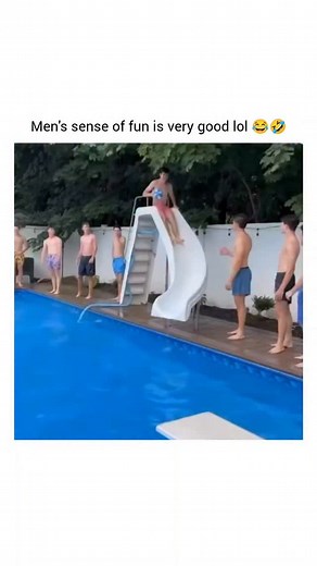 guff vibes on Instagram: "This is a humorous video capturing a group of young men playing a chaotic game in a backyard pool. The clip shows several young men lined up around the pool's edge, waiting their turn to slide down a short waterslide. The objective of the game appears to be hitting a small ball or object across the pool after landing. Each participant descends the slide, launching himself into the water with a splash, and then attempts to hit the object, often resulting in massive, coor