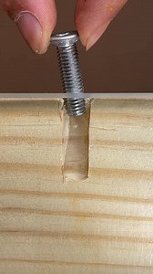 Hot glue trick to secure a wall-embedded nut. | Tuan CT