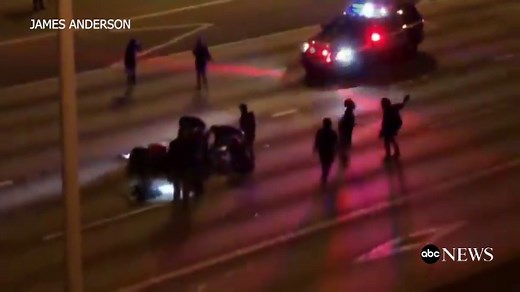 Video shows car striking 2 protesters on Seattle highway