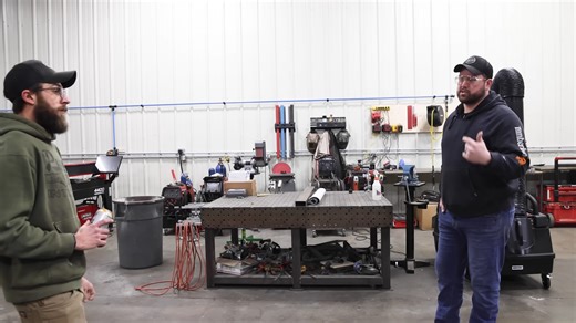 Guy almost dropped a 200lb steel plate on his toes building a metal rack