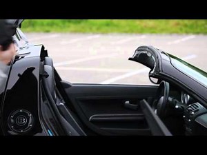 How do you replace the roof of the Smart Roadster?