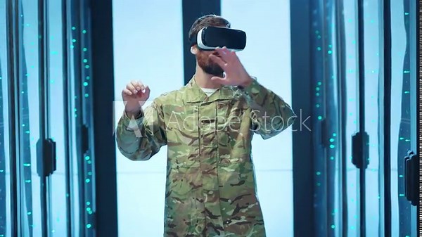 Bearded military engineer with VR headset using a virtual 3D interface running backups techniques eliminating red lights error working in modern data center. Future, people and technology.