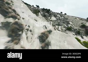 Italian gullies, white mountains near the sea in FPV aerial Stock Video Footage - Alamy