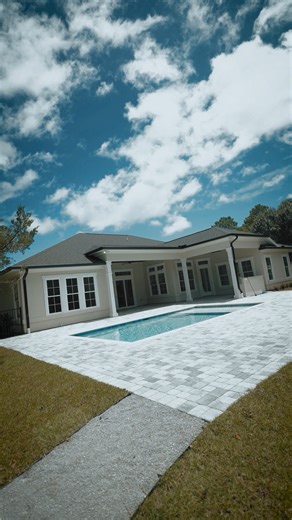 Clients trusted her with a 5,000 sq. ft. Plantation Point brand new dream home from 1,000 miles away... sight unseen. Meanwhile, Kaci Vaught conducts the final testing on the pool quality. Shoutout to Heritage Construction and the Dargan Real Estate team for being absolute rockstars! The collaboration made this transition seamless and the craftsmanship in this home speaks for itself - thoughtful design, top-notch details, and built to stand the test of time. The Vaught Group: we don't just close