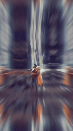 Romantic Moments Near a Waterfall in Autumn