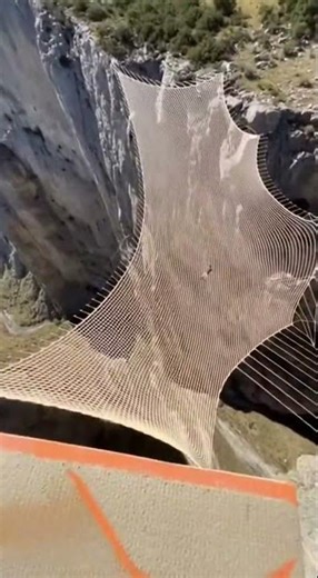 High Cliff Jump Into Giant Safety Net – Ultra-Realistic 8K”