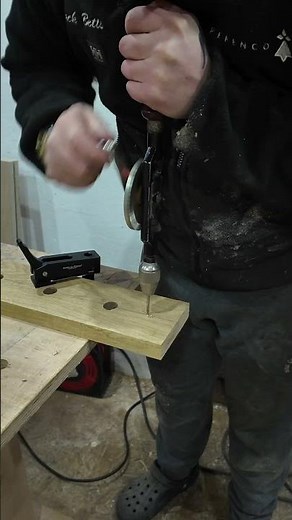 A coat hanger with hand tools.