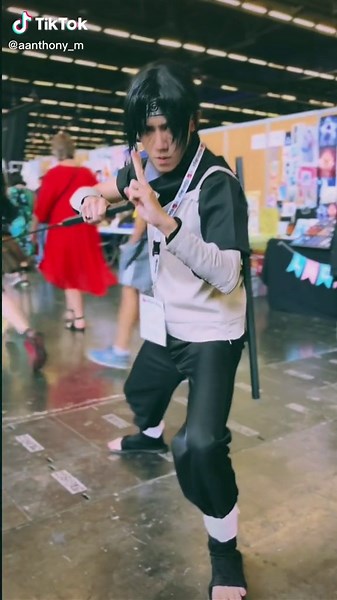 Striking a Pose at Japan Expo: Cosplay Fun with Itachi from Naruto