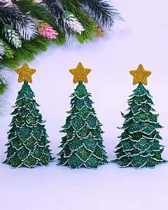 Spruce up your home for the holidays with simple and affordable DIY Christmas tree ideas. Create personalized ornaments and charming decorations to make your festive home decor merry and bright. | DIY Crafts & Art