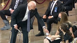 Joe Biden picks up toy for daughter of fallen officer