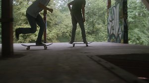Free stock video - Caucasian boys skateboarding in a ruined building.