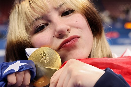 How is figure skating judged and scored at the Winter Olympics?