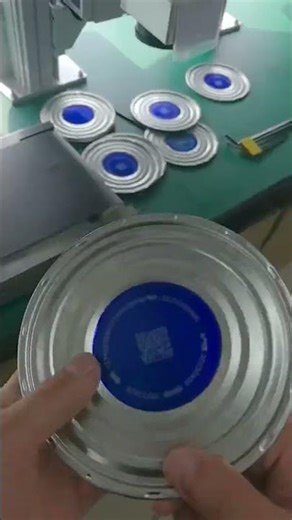 Laser Marking Machine Facilitates QR Code and Serial Number Printing on Metal Milk Bottle Bottoms