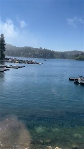Beautiful lake views, clouds floating by, a duck enjoying Lake Arrowhead. What are some things you like to enjoy while visiting with us? | Lake Arrowhead Village