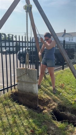 Incredible the amount of subsistence in soft sand Alicia raising a badly sunken marble tablet stone in Hyannis, Massachusetts | Gravestone & Monument Preservation