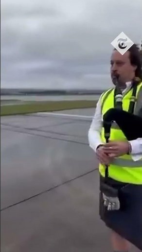 Snoop Dogg dances to bagpipes playing Still D.R.E. at Glasgow Airport
