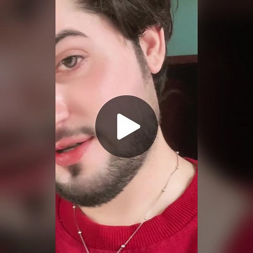 Close-Up of Stylish Red Sweater and Pendant Necklace