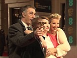 Emma Thompson and husband Greg Wise pose at 2015 BAFTAs