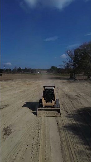 🚧 CAT Skid Steer Smoothing Out the Dirt