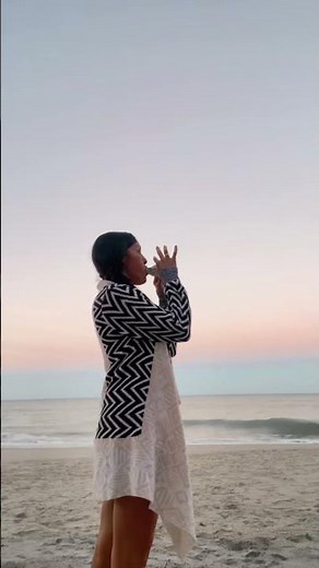 Beachfront Serenade: Woman Plays Conch Shell Horn at Dawn#conchshell #beachmusic