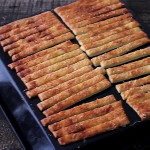 Buttery, crispy, with cheesy flavor, these cheese sticks are a great snack for any occasion. Full recipe: http://bit.ly/1UCCiY5 | Home Cooking Adventure