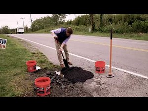 Asphalt parking lot pothole repair