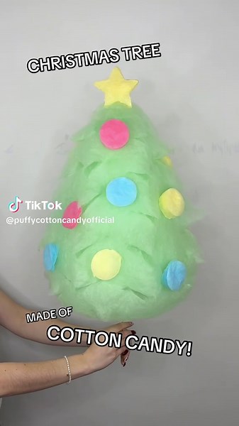 IT’S A CHRISTMAS TREE! Made entirely of freshly spun cotton candy, this towering tree is one tasty treat! #merrychristmas #art #fyp