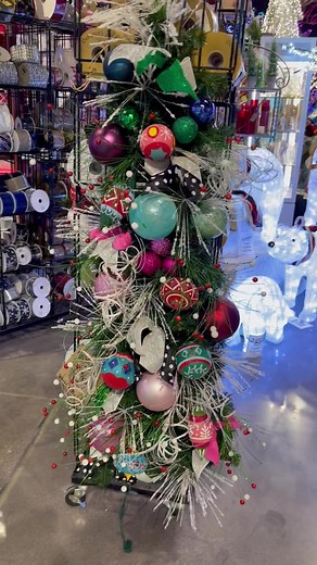 This tree hangs on your wall! It has led lights- fully decorated and wired on. Great for small spaces or festive decor for the holidays | Brite Ideas Decorating | Facebook