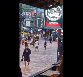 Tourists swamped by floods on Thailand's Death Island