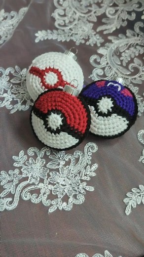 A fun and simple way to add a little Pokemon to any holiday tree! I've seen folks crochet around ornaments for years now, but most recently I was inspired by @tashi.at.home for making ornaments this way. So I combined that technique with the Pokeball patterns I have from my cardigan and voila! I want to make more. Which balls do I make??? #pokeball #masterball #premierball #pokemonornaments #pokeballornament #pokemonxmas #pokemontree #crochetornaments #pokemonholiday | Katzer's Creations