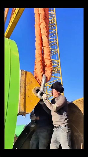 Real Engineerings | Engineering & Technology & Gadgets & DIY on Instagram: "Building Giants: Wind Turbine Assembly! 🌬️🏗️ ​Constructing a wind turbine is a monumental task that requires heavy machinery and microscopic precision. Watch as this massive green tower section is hoisted and secured into place. ​A High-Stakes Assembly ​Every step of this process involves moving tons of steel with absolute accuracy: ​Rigging Up (0:00 - 0:17): Safety is paramount. The video starts with the crew securing