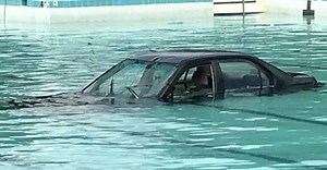 Driver's Parking Practice Ends With Car Submerged In The Community Pool, Twitter Has Jokes