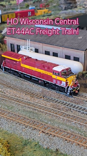 HO Scale Wisconsin Central ET44AC Freight Train Passes Engine Shed!