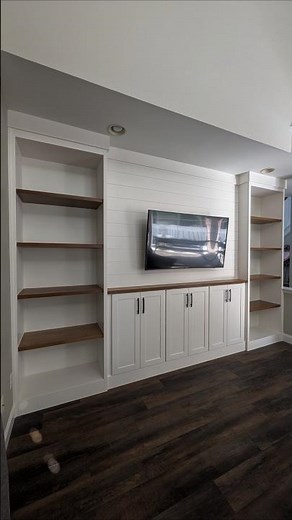 Built-In Entertainment Center with plenty of storage and display space.