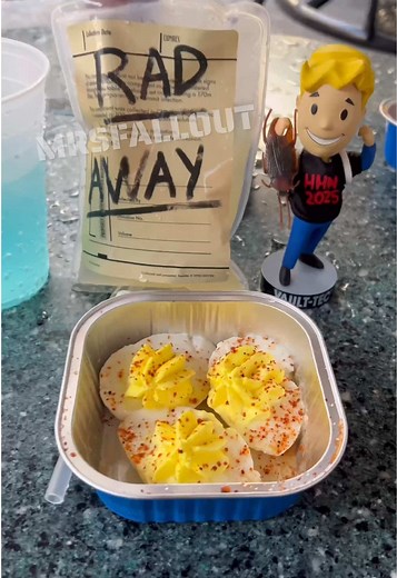 Trying everything on the Fallout Menu at Halloween Horror Nights - part 1: Yum Yum Deviled Eggs (coconut panna cotta with pineapple & tajin, this didn’t taste bad but it was a texture thing for me, I couldn’t even pick it up without it just falling apart ☢️) And the Radaway (Chipotle pineapple brown sugar lemonade - this tasted like maple syrup drink to me ☢️) #fallout #mrsfallout #fallouttok