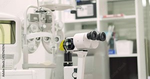 close up of phoropter, specialized instrument used in eye examinations to measure refractive errors and determine eyeglass prescriptions, eye medical clinic