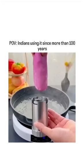 smile fuel on Instagram: "The instagram post showcases a video of a modern electric handheld noodle extruder producing pink noodles in boiling water, captioned "POV: Indians using it since more than 100 years" to highlight cultural precedence over trendy gadgets. This alludes to the traditional Indian sev sancha, a manual press for extruding chickpea flour into hot oil for sev snacks, a tool used in households for generations as documented in culinary histories dating to at least the 19th centur