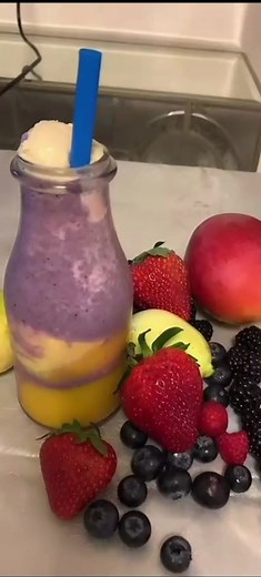 Colorful Fruit Smoothie Preparation at Home
