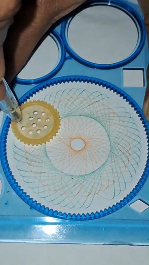 Watch the creation of this stunning, elegant geometric pattern! This design uses the Spirograph tool to create a hypotrochoid curve that results in a beautiful, open pattern with visible "spokes." It's incredibly satisfying to watch the complex math turn into simple, gorgeous art. This pattern is great for using multiple colors to fill in the different sections! What's your favorite satisfying sound effect to pair with art videos? Tell me! #shorts #youtubeshorts #shortsvideo #spirograph #spirogr