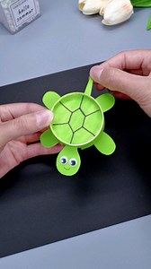 Create an adorable turtle using a simple paper cup! Follow these easy steps to transform an ordinary cup into a charming turtle. Start by painting the cup to resemble a turtle shell, then add a cute face and flippers using colored paper. This fun and crafty project is perfect for kids and adults, offering a delightful way to recycle and create a whimsical decoration. Watch as your paper cup turtle comes to life with personality and charm! | Paper Craft Ideas
