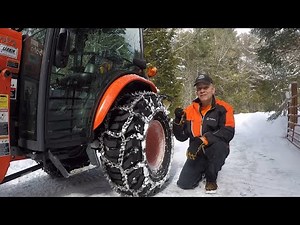 538 Skid Shoes and Studded Chains. Kubota LX2610 Cab Tractor. LX2980 Snow Blower.
