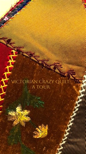 Crazy Quilts” of the sort shown here were popular in the US in the late 1800s, especially among wealthier women who had access to the fine fabrics we associate with these quilts. They also had the leisure time to do all the elaborate embroidery designs. The example here are somewhere near the middle on the spectrum of “elaborate” crazy quilts of the era. The first one shown is much fancier than the second one, shown in the flyover, giving you a sense of the range of some of these designs. Crazy 