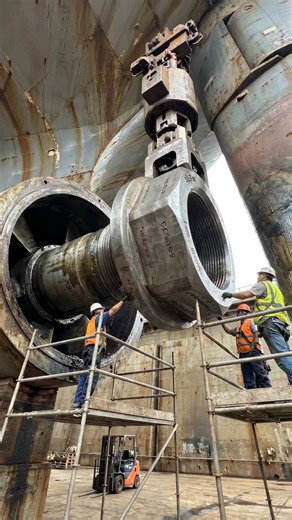 Wow Things on Instagram: "Engineers Install a Mega Industrial Shaft Up Close! ⚙️ Ever seen a bolt so big it takes multiple workers and lifting systems just to position it? 🔩🏗️ This massive industrial shaft and threaded connection is part of a heavy mechanical system that handles enormous loads, often found in power plants, refineries, and giant processing facilities. Every turn of this giant fastener must be perfectly aligned to withstand extreme pressure, torque, and vibration. It’s not just