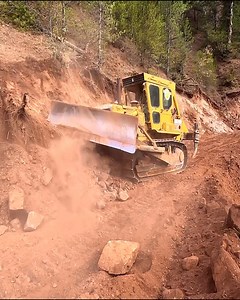 253K views · 5.9K reactions | Cat D7g Dozer Adjusts Road Height By Scraping Large Rocks On Hills | Graders Tv | Facebook